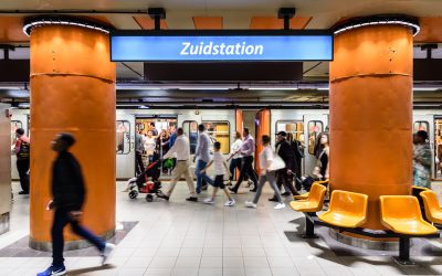 Brussels, Belgium - April 21, 2019: Passengers getting off the train on the platform of lines 2 and 6 in the Gare du Midi/Zuidstation subway station, located under the Brussels-South railway station.