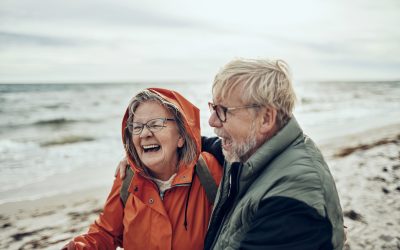 Close up of senior couple having a walk by the beach